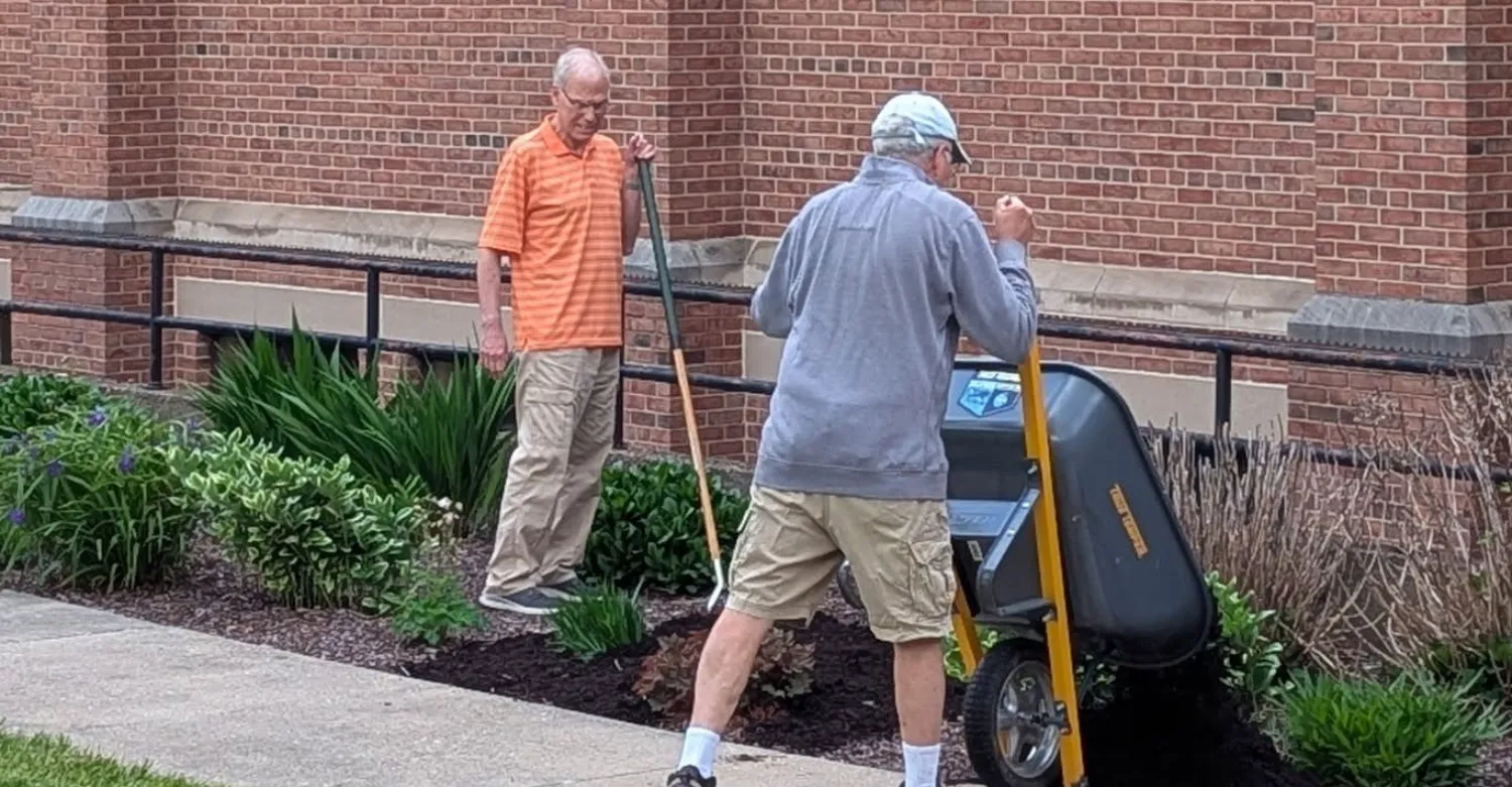 Two men gardening